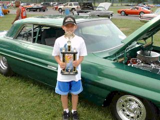 Ron's Son Nathan showing of the 1st place trophy (the real brains behind the operation!)